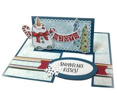 a christmas card with a snowman holding a candy cane