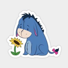 a blue cartoon character sitting next to a sunflower on a white background with the words,