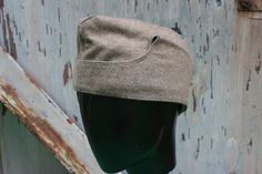 "Vintage military cap. It has poppers at the crown, which can unfasten to make it into a balaklava type hat. Labelled Bamburger Mutzen Industrie. Measures 21\" head circumference. It shows signs of wear, but is still useable." Military Cap For Hunting, Winter Military Hat With Curved Brim, Military Style Khaki Hunting Hat, Khaki Military Hat For Hunting, Khaki Military Style Hunting Hats, Garrison Cap, Police Hat, Army Hat, Fab Dress