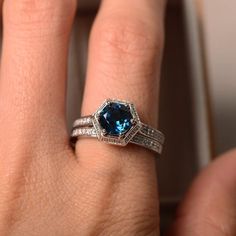 London blue topaz ring engagement ring sterling silver | Etsy 14k White Gold Topaz Birthstone Promise Ring, Elegant Blue Topaz Halo Ring For Wedding, Dazzling Blue Topaz Ring With Center Stone, 14k White Gold Topaz Ring With Center Stone, Elegant Blue White Topaz Rings, Classic White Gold Topaz Ring, Blue Brilliant Cut Topaz Ring For Wedding, Formal 14k White Gold Topaz Birthstone Ring, Blue Topaz Halo Ring For Wedding