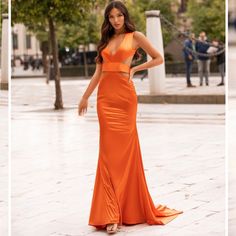 Beautiful Unique Orange Gown! This Is A Made To Order Item. I Planned On Wearing It To A Black Tie Wedding But Went With A Tuxedo Look Instead. Tags Removed But Outside Of Trying It On, It Has Never Been Worn. Sizing Is Tricky- It Is An Xs But My Measurements Are 38 Bust, 27 Waist, 36 Hip With 36d Bra And This Fits Me, The Bust Strap Is A Bit Tight But As You Can See From The Photos Everything Else Looks Perfect. I’m Normally A Small. The Material Is A Thick Stretchy Satin, Very Flattering. I’m 5’8” And As You Can See It Has A Train- I’m Wearing A 2 Inch Heel For The Pics. From An Australian Brand- If You Need A Gown And Don’t Want To Get The Same One Everyone Is Getting From Orange Gown, Alamour The Label, Orange Satin, Black Tie Wedding, Dreamy Dress, Satin Gown, Mermaid Gown, Red Aesthetic, Vibrant Orange