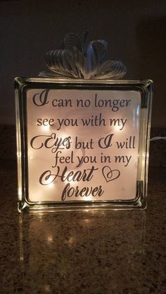 a lighted sign that says i can no longer see you with my eyes but q will feel you in my heart forever