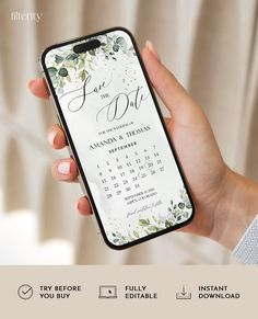 a person holding up an iphone case with the wedding card on it's screen