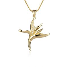 In this photo there is a small yellow gold bird of paradise pendant with diamonds. Elegant Gold Jewelry With Bird Design, Yellow Gold Bird Design Pendant Jewelry, Elegant Bird Design Jewelry For Anniversary, Elegant Gold Necklace With Bird Design, Bird Of Paradise Flower, Birds Of Paradise Flower, Flower Motif, Bird Of Paradise, Yellow Gold Pendants