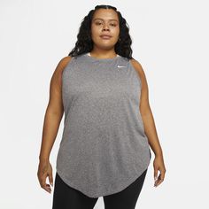 Turn up the heat in this sweat-wicking racerback tank. A roomy fit through the body and hips has a relaxed feeling that lets you move freely wherever your workout takes you. Nike Sweat Resistant Activewear For Yoga, Nike Sweat-resistant Activewear For Yoga, Nike Athletic Fit Go-dry Activewear, Nike Go-dry Activewear For Workout, Nike Sleeveless Sports Activewear, Nike Athletic Fit Activewear For Workout, Nike Gray Athletic Fit Activewear, Gray Racerback Functional Top, Gray Functional Racerback Top