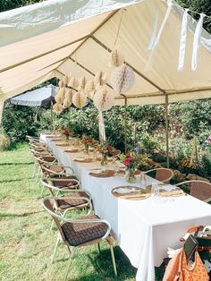 a long table set up under a tent