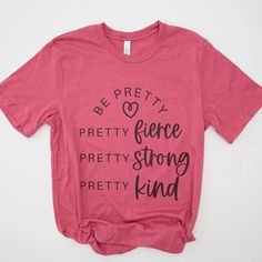 Be Pretty, Pretty Fierce, Pretty Strong, Pretty Kind T-Shirt If you love photography and cameras, this "Be Pretty, Pretty Fierce, Pretty Strong, Pretty Kind" T-Shirt is perfect for you. It features a classic Bella Canvas design with a traditional scoop neckline. Experience the ultimate comfort with our incredibly soft, true-to-size graphic tees that showcase your love and passion for life. Whether it’s a reflection of what you do, who you are, or what you stand for, finding the perfect witty, up Boutique Hub, Passion For Life, Be Pretty, Pink Brand, Canvas Designs, Felt Hearts, Photography Services, Quality T Shirts, Love Photography