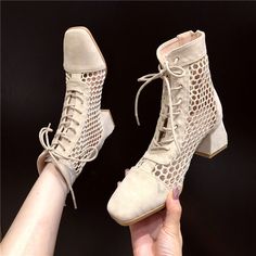 Material: SuedeSize: CN34, CN35, CN36, CN37, CN38, CN39, CN40, CN41, CN42Color: Black, BeigeHeight High: 5CMStyle: Summer, FashionPattern Type: Suede, Square Toe, Cutout, Strap, Chunky Heel, Calf BootsOccasion: Casual, Party, SummerPackage Contents: 1* Shoes, without Accessories. Trendy Spring Martin Boots With Square Toe, Trendy Square Toe Martin Boots For Spring, Casual Martin Boots With Square Toe For Spring, Trendy Beige Martin Boots For Spring, Spring High Heel Martin Boots, Beige Closed-toe Summer Boots, Beige Closed Toe Boots For Summer, Beige Closed Toe Summer Boots, Spring Party Lace-up Martin Boots