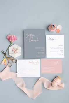 the wedding stationery is laid out and ready to be put into the bride's bouquet