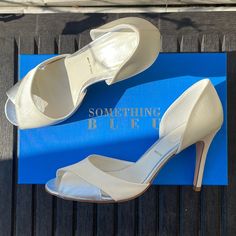 New In Box Something Bleu Ivory Satin Wedding Shoes Size 8 3” Heel Front Is Open Toe Style Has A Metallic Silver Leather Panel Detail On Front Of Shoe To Give An Extra Bit Of Something Special Perfect For Wedding Day, Bridal Shower, Rehearsal, Reception Always Packed With Love And Care! Don’t Forget To Bundle All Your Likes! Satin Wedding Shoes, Feather Heels, Special Occasion Shoes, Leather Panel, Blue Pumps, Metallic Heels, Satin Pumps, Ankle Strap Pumps, Wedding Heels