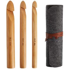 three wooden objects are shown in different styles and sizes, including one with a leather band