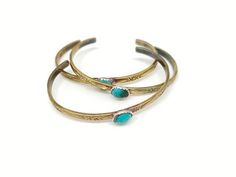 A natural Turquoise stone (8x10mm) is set in a fine silver serrated bezel on a floral, sturdy brass band. Cuff is adjustable, and can be made smaller or larger, perfect for stacking or wearing alone! Turquoise is a stone long associated with protection, luck/good fortune and hope. Natural Turquoise Stone, Brass Band, Good Fortune, Natural Turquoise, Turquoise Stone, Fine Silver, Gold Bracelet, Bangles, Cuff