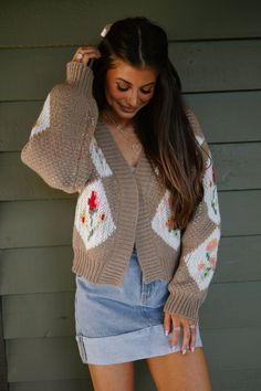 Wrap yourself in cozy warmth and elegant style with our Vintage Floral Bouquet Cardigan. Made with chunky knit for ultimate comfort, this cardigan also features intricate floral pattern details in a timeless taupe color. Perfect for adding a touch of vintage charm to any outfit. 100% polyester Model is 5'6" with a 35" bust, 26" waist, and 36" hips wearing a size small Vintage Floral Bouquet, Maxi Tops, Dresses By Length, Taupe Color, Short Rompers, Top Sales, Floral Bouquets, Chunky Knit, Elegant Style