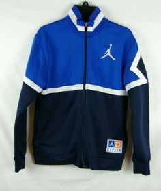 You are buying a Jordan multiple shades of blue long sleeve full zip sweatshirt jacket. This sweatshirt jacket is a boy's/ kid's size large 12- 13 years. It is 100% polyester.  Condition: Pre- owned/ used. Excellent condition, with no damage or stains. This sweatshirt jacket comes from a non- smoking and pet free home. If you have a question about any of our items, please contact us for further assistance. Fast Free Shipping within the USA. (We offer international shipping via eBay’s Global Ship Blue Cotton Sporty Varsity Jacket, Blue Varsity Jacket For Winter, Blue Crew Neck Varsity Jacket For Winter, Blue Cotton Varsity Jacket For Sports Events, Blue Long Sleeve Varsity Jacket With Ribbed Cuffs, Varsity Blue Track Jacket For Sports Events, Blue Varsity Track Jacket For Sports Events, Blue Varsity Sweatshirt For Sports Events, Blue Winter Track Jacket For College