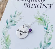 "Sterling Silver Grandma Necklace.                                This necklace has one 5/8\" 14k sterling silver  disc and up to 7 cz birthstones. Necklace comes with a 20, 18, or 16\" 14k gold cable chain. Please provide the following at checkout in message to seller box: -Name you want stamped                                            -Birthstones - Please see forth photo for birthstone colors  Each letter has been individually hand stamped. Because of this, the lettering may have slight var Sterling Silver Birthstone Necklace Round Pendant For Mom, Personalized Mother's Day Birthstone Necklace Round Pendant, Personalized Round Pendant Birthstone Necklace For Mother's Day, Personalized Birthstone Necklace For Mother's Day, Round Mother's Day Necklace With Hallmark, Mother's Day Personalized Round Pendant Birthstone Necklace, Round Necklace With Hallmark For Mother's Day, Engraved Sterling Silver Birthstone Necklace For Mom, Mother's Day Round Birthstone Necklace