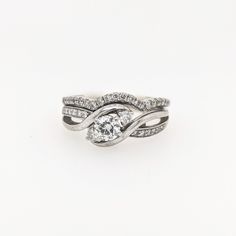 a white gold and diamond ring