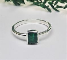 Discover the timeless beauty of our Natural Emerald Ring, a stunning piece crafted in 925 sterling silver that radiates elegance and sophistication. This exquisite solitaire features a genuine 5x7 MM green emerald, renowned as the May birthstone, which sparkles enchanting hues that symbolize love and renewal--ideal for unique engagement moments or as a meaningful gift for someone special. Each emerald is carefully selected to ensure a good clarity and delightful emerald cut, creating a luxurious Green Emerald Jewelry, Engagement Moments, Emerald Solitaire Ring, Smaragd Ring, Natural Emerald Rings, Emerald Gem, May Birthstone, Emerald Engagement, Emerald Engagement Ring