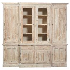 a large wooden cabinet with glass doors and shelves on the front, against a white background