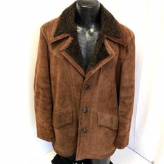 "Excellent vintage condition! Heavy weight split cowhide leather jacket. Acrylic blend lined. Look: Cowboy western Brand: unbranded Size (Men's): 42 Color: dark brown Material: split cowhide Measurements Chest: (Across chest armpit to armpit, doubled): 48\" Overall Length:31\" Sleeves (From outer edge of shoulder to outer cuff of sleeve): 26\" Shoulders (Across top of Shoulders): 20\"" Western Leather Outerwear With Button Closure, Western Style Leather Outerwear With Button Closure, Western Style Brown Leather Jacket For Winter, Brown Western Leather Jacket For Winter, Classic Leather Outerwear With Suede Lining, Western Style Winter Outerwear With Snap Buttons, Western Brown Outerwear With Button Closure, Western Brown Outerwear With Snap Buttons, Winter Leather Single Breasted Sport Coat