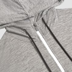 This performance quarter zip pullover in a stylish speckled heather pattern features an adjustable drawstring hood. Beyond warmth and comfort, this garment offers UV50 SPF protection, making it perfect for outdoor activities. Gray Functional Sweatshirt With Adjustable Hood, Functional Half-zip Hoodie With Drawstring Hood, Functional Gray Track Jacket With Drawstring Hood, Sporty Heather Grey Outerwear With Drawstring Hood, Functional Half-zip Outdoor Hoodie, Casual Activewear With Drawstring Hood And Half-zip, Casual Half-zip Activewear With Drawstring Hood, Casual Half-zip Activewear For Light Sports, Gray Moisture-wicking Sweatshirt For Outdoor