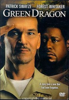 the green dragon movie poster with two men looking at each other and one man holding his head