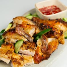 chicken and vegetables on a plate with sauce