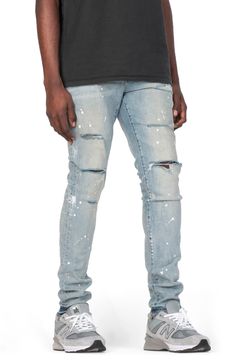 Threadbare holes, spatters of paint and dirty, grungy fading bring lots of signature appeal to these low-rise skinny jeans made with a hint of stretch. 32" inseam, 10" leg opening; 10" front rise; 15" back rise (size 29) 98% cotton, 2% Lycra® spandex Machine wash, line dry Imported Asian Owned/Founded Fire Clothes, Paint Splatter, Nordstrom, Purple, Pants, Clothes