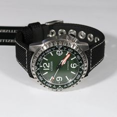 Item No. NJ2198-16X Citizen Automatic Bottle Cap Green Dial Men's Watch NJ2198-16X Watch Features: Automatic Movement Caliber 8210 40 Hour Power Reserve Stainless Steel Case Nylon Leather Strap Push Pull Crown Analog Display Green Dial Mineral Crystal Screw Back Case Buckle Clasp Case Diameter: 46 mm Case Thickness: 12 mm Water Resistance: 24mm 21 Jewels Free Priority Shipping on all orders in continental U.S. Shipping time is usually between 2 and 6 day's. 1 day handling time. About Us We are a Authentic Watches, Minerals Crystals, Men's Watch, Breitling Watch, Bottle Cap, Stainless Steel Case, Leather Straps, Buckle, Stainless Steel