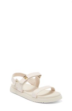 A strappy sandal is lofted by a platform for on-trend appeal in their everyday wardrobe. Synthetic upper/textile lining/synthetic sole Imported White Synthetic Ankle Strap Footbed Sandals, White Sport Sandals With Buckle Closure For Spring, Spring White Sport Sandals With Buckle Closure, White Synthetic Sandals With Adjustable Strap, Spring Flat Sport Sandals With Adjustable Strap, White Adjustable Strap Synthetic Sandals, Summer Sport Sandals With Heel Strap And Synthetic Material, White Sport Sandals With Adjustable Strap For Spring, Summer Sport Sandals With Strap, Synthetic