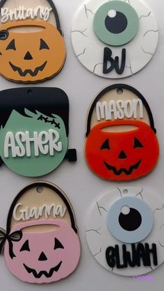 halloween themed name tags with pumpkins and jack - o'- lantern faces