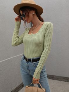 Our Shell Knit Top comes in a sage green colour. A gorgeous knit piece with a strong point of view, this top is expressing style in the most fabulous way. It features a scallop shaped neckline and cuff, long sleeves and tight fit on the body great for pairing with a jean finished with our leather boots! Size Guide: Tina is 5’2” tall, and has a 33.2” bust, 24.5”waist, & 36.7” hips. She is wearing a S / US 4 / AU 8. This knit cardi is true to size. Feature: Slightly cropped long sleeves. Pull on s Green Stretch Long Sleeve Knit Top, Trendy Green Long Sleeve Knit Top, Green Long Sleeve Knit Top For Fall, Green Textured Knit Long Sleeve Top, Chic Green Textured Knit Sweater, Chic Textured Green Knit Sweater, Chic Green Crew Neck Sweater, Green Pointelle Knit Winter Top, Chic Green Crew Neck Knit Top