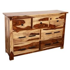 a large wooden dresser with drawers and handles