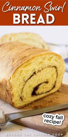 cinnamon swirl bread on a cutting board with a knife next to it and the title overlay reads, cinnamon swirl bread cozy fall recipe