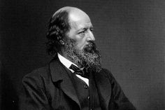 an old black and white photo of a man with a long beard wearing a suit