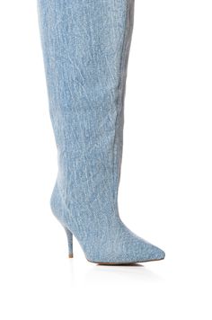 The AZALEA WANG Amby Bucket Boot In Denim features a washed denim upper, a pointed toe silhouette, a slim stiletto heel, a bucket-inspired oversized shaft, a thigh high design, and a pull-on fit. Pair with your fave denim and moto jacket for a chic look. (all measurements approximate from size 7.5): - Denim Upper - Pointed Toe - Stiletto Heel - 24” Shaft Height - 27” Shaft Circumference - 20.5” Calf Circumference - 3.5” Heel Height - Imported Product ID: 364061 Bucket Boots, Azalea Wang, High Design, Higher Design, Washed Denim, Moto Jacket, Thigh High, Stiletto Heel, Thigh Highs