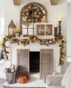 a living room with a fireplace decorated for fall