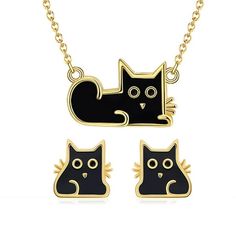 Step into the world of elegance and whimsy with the Black Cat Earrings and Necklace Set, a charming offering from the Ginger Lyne Collection. This set is a tribute to the sleek beauty of black cats, crafted with meticulous detail in 14KT gold over sterling silver and adorned with striking black enamel. The pendant, measuring 12mm, dangles gracefully from an 18-inch rolo chain, while the matching earrings, at 11mm, are a subtle yet enchanting addition to any outfit. Weighing a comfortable 3g for Cute Gold Alloy Jewelry, Cute Gold Jewelry With Cat Design, Elegant Cat Design Jewelry For Party, Gold Jewelry With Cat Design For Mother's Day, Mother's Day Gold Jewelry With Cat Design, Elegant Party Jewelry With Cat Design, Metal Jewelry With Cat Design For Gift, Metal Cat Design Jewelry As Gift, Cat Design Metal Jewelry As Gift