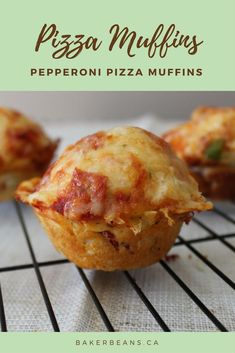 some pizza muffins sitting on top of a rack with the words pepperoni pizza muffins