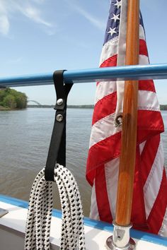 an american flag on the back of a boat with text overlay reading made in the usa