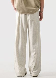 Experience unmatched comfort with our Wide Leg Drawstring Panel-Pleated Sweatpant Joggers, your new go-to for effortless style. Crafted from a premium blend that is both soft and durable, these joggers feature a distinctive panel-pleated design adding a touch of sophistication to a relaxed fit. The wide-leg cut ensures freedom of movement while the drawstring waist offers customizable comfort. Perfect for a laid-back weekend or a casual day out, these joggers can be paired with a fitted tee for Relaxed Straight Leg Joggers For Leisure, Solid Color Relaxed Fit Sweatpants With Drawstring, Joggers With Drawstring Straight Leg, Relaxed Fit Wide-leg Sweatpants For Leisure, Casual Baggy Sweatpants For Lounging, Wide Leg Lounging Joggers With Pockets, Comfortable Solid Color Wide-leg Sweatpants, Wide Leg Joggers With Pockets For Lounging, Comfortable Solid Wide-leg Sweatpants