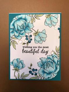 a card with blue flowers on it that says, wishing you the most beautiful day