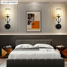 a large bed sitting in a bedroom next to two wall sconces and a painting on the wall