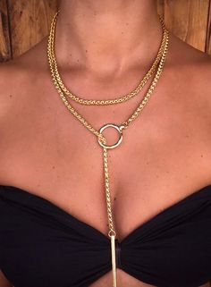 "Trendy Long Doubble Wrap chain. Goldfielld Necklace with Charm and Element Pendant, Statement Women Jewelry A fashionable necklace that will definitely become your favorite one. This necklace features double-wrap braided chain.  In its edges, it has several 14k goldfilled element pendants that add charm to it.    Wear it long as a \"Y\" necklace or wrap it around the neck as a layered necklace. You can Style it with an evening dress, t-shirt, and jeans, or a boho top tank. Either way, you're sure to dazzle for those who value trendy vision! Add this fabulous necklace to your jewelry collection or give it as a gift to a dear woman in your life.  ~ << ✦ ✥ ✥ ✥ ✦ >> ~  ▲ Material: 14 k goldfilled   ▲ Measurement: Necklace length - 95 cm  ▲ Care instructions: I use the best and high-quality ma Gold Choker Drop Necklace With Clavicle Chain, Gold Dangle Drop Necklace For Party, Gold Drop Necklace With Adjustable Chain For Layering, Gold Dangle Lariat Necklace For Parties, Lariat Choker With Clavicle Chain, Lariat Clavicle Chain Choker, Clavicle Chain Lariat Choker, Gold Dangle Chain Necklace For Layering, Gold Metal Lariat Drop Necklace