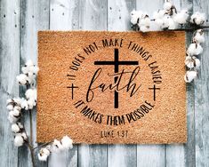 a door mat with a cross and the words, i hope not make things happen