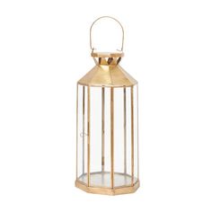 a gold colored metal lantern with glass sides