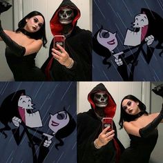 a woman dressed in black and red holding up a cell phone while wearing a skeleton costume