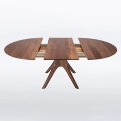 a wooden table with four pieces of wood on it's legs and one piece of wood