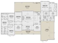 the first floor plan for a home with two master suites and three full bath areas