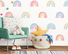 a child's room with rainbow wallpaper and a toy basket on the floor