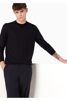 Find Emporio Armani Men Asv Lyocell And Wool-blend Jumper on Editorialist. Plain-knit crew-neck jumper in a virgin-wool and Lyocell blend. The minimalism and classic lines of this mens jumper encapsulate the true style of Emporio Armani. The style is made from a Lyocell blend, a semi-synthetic fibre that has an exceptionally low impact on the environment. It is derived from eucalyptus trees and is renowned for being very durable, breathable, absorbent and wrinkle-proof. This item belongs to the Essentials Clothing, Emporio Armani Men, Latest Sweater, Crew Neck Jumper, Clothing Essentials, Armani Men, Mens Jumpers, Shirt Collar, Blue Sweaters